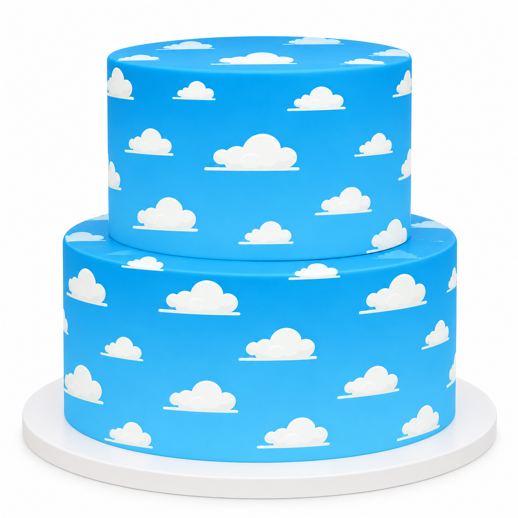 Two-tier birthday cake decorated with blue sky and white clouds edible cake wrap on a white pedestal