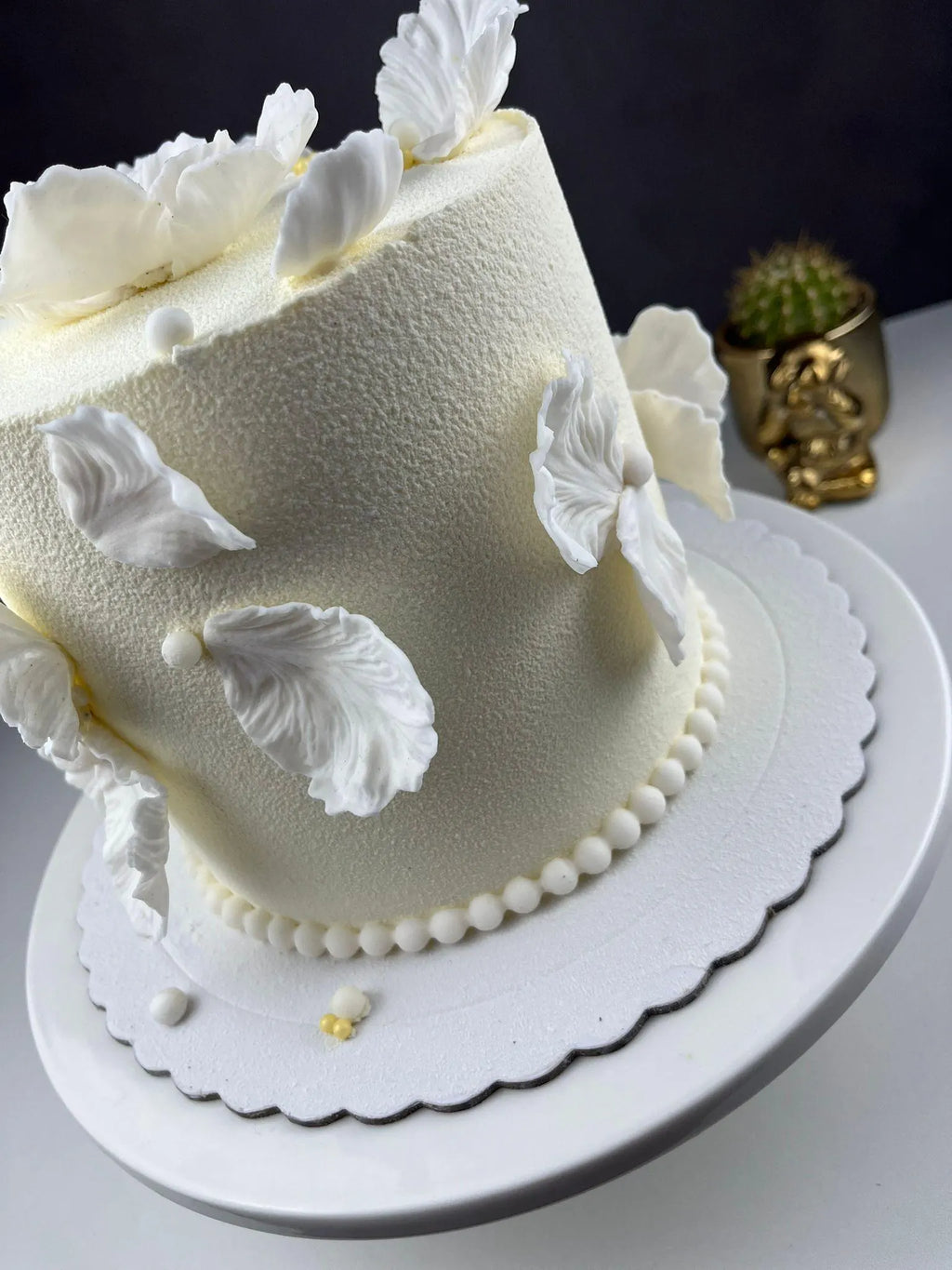 Handmade edible fondant leaves for elegant wedding cake decoration, image 4.