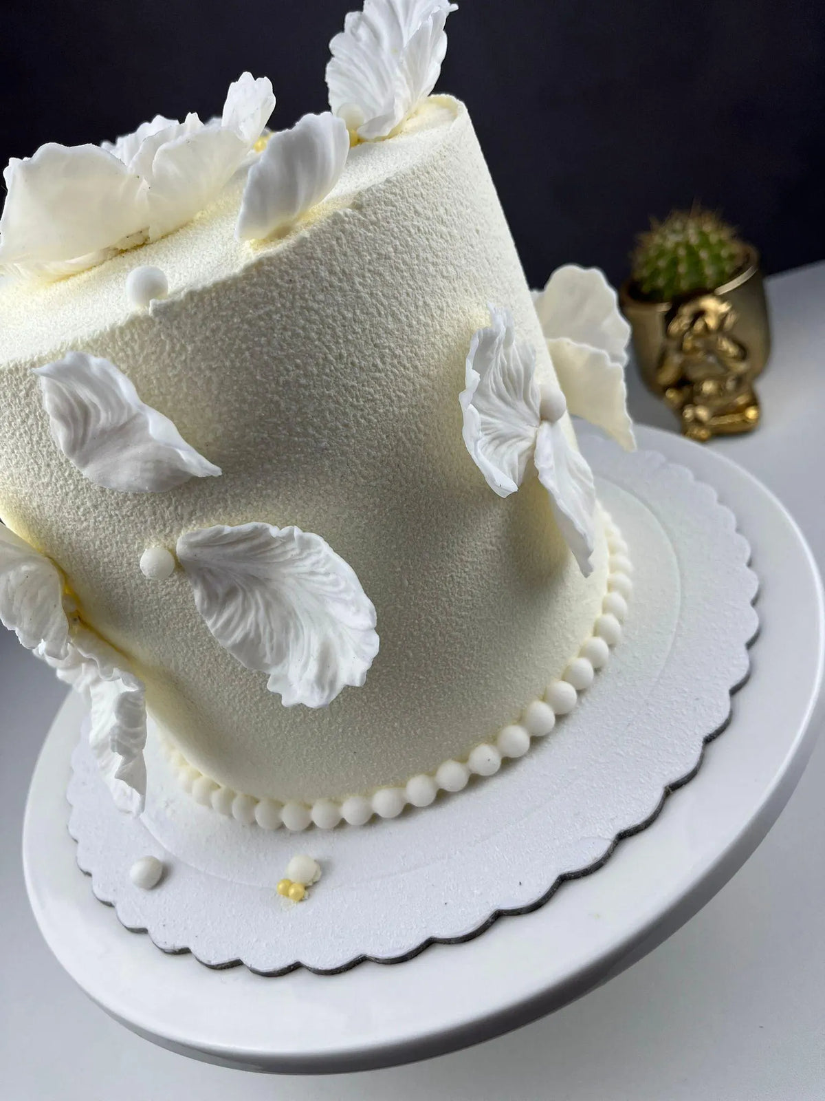 Handmade edible fondant leaves for elegant wedding cake decoration, image 4.