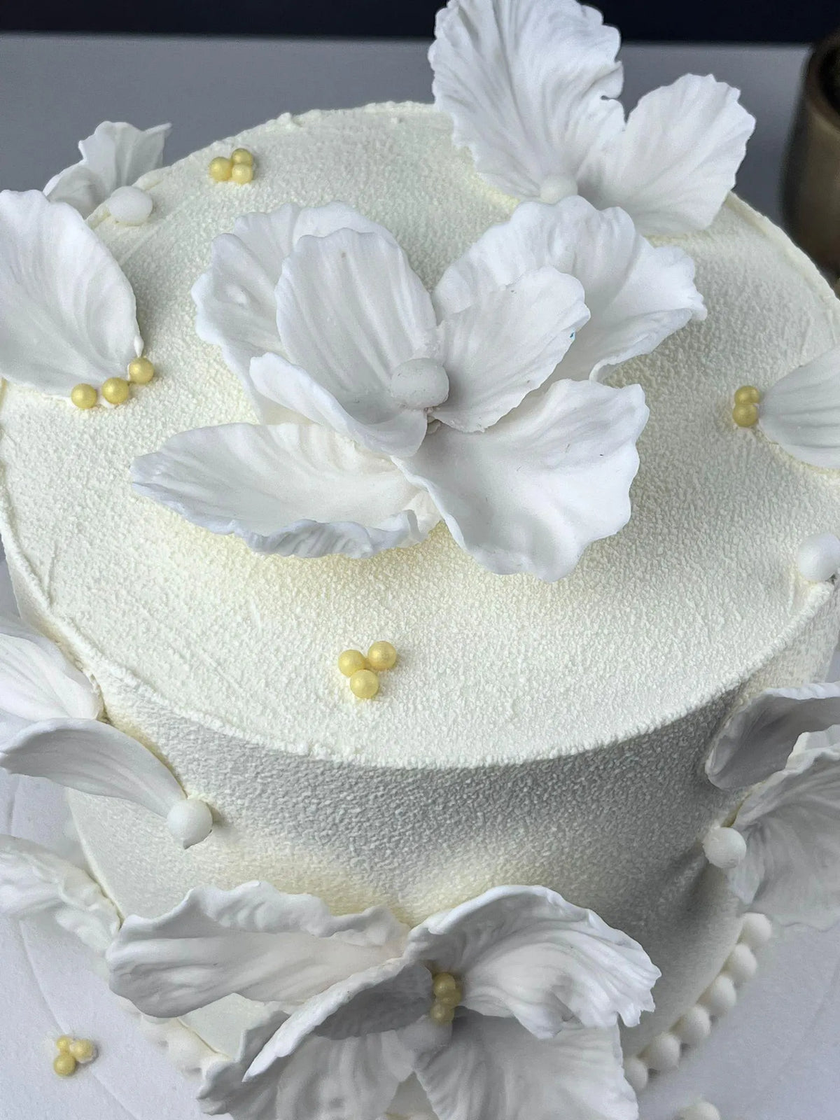 Handmade edible fondant leaves for elegant wedding cake decoration, image 5.