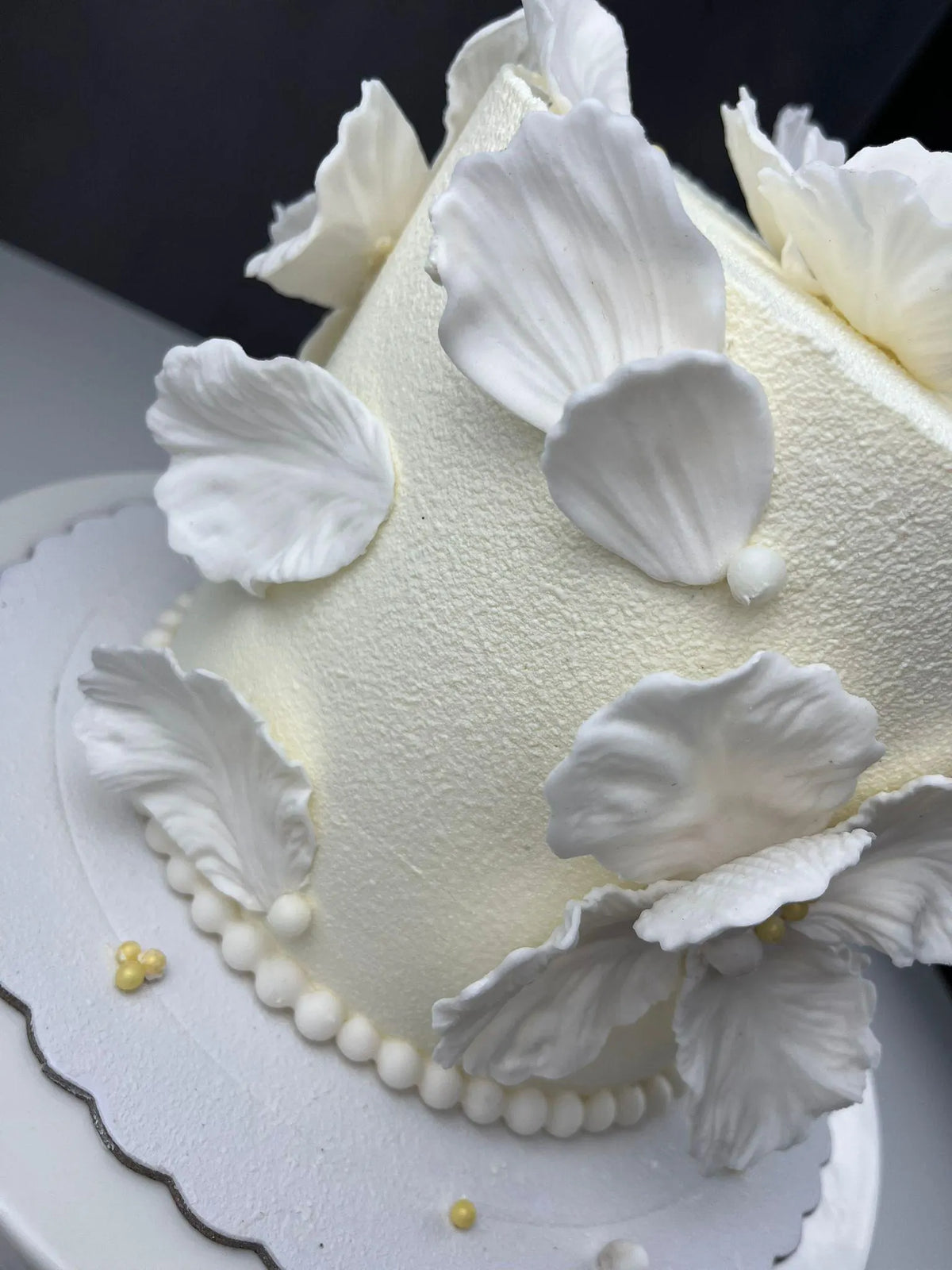 Handmade edible fondant leaves for elegant wedding cake decoration, image 6.