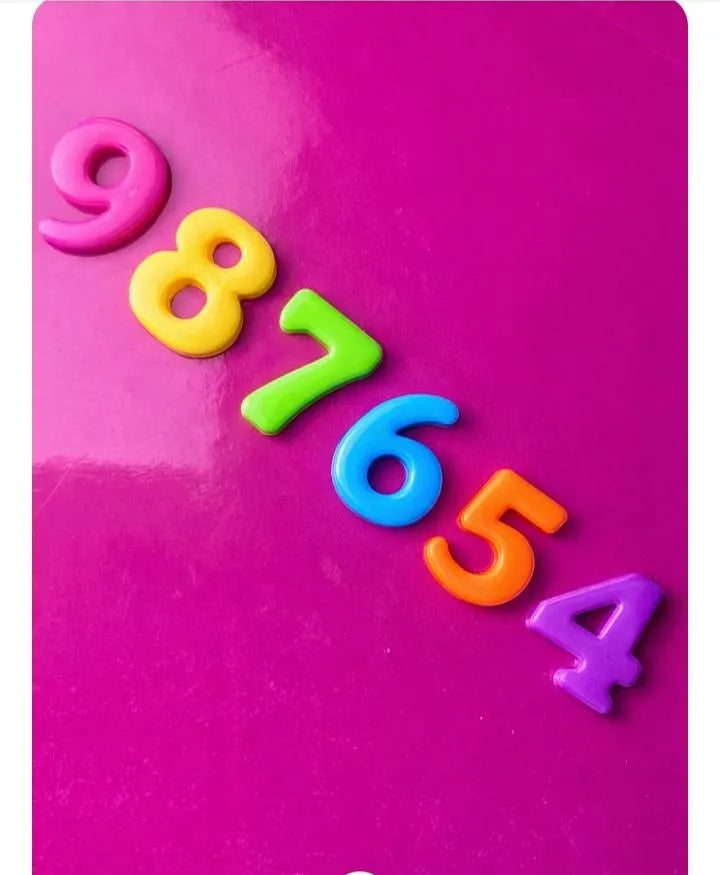 Edible fondant letters and numbers for personalized cake and cupcake decoration.