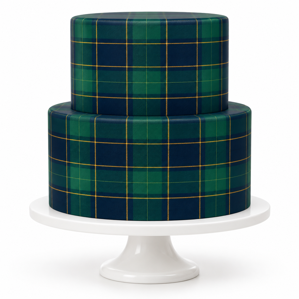 Two tier green and navy tartan cake decorated with gold effect check lines on white cake stand