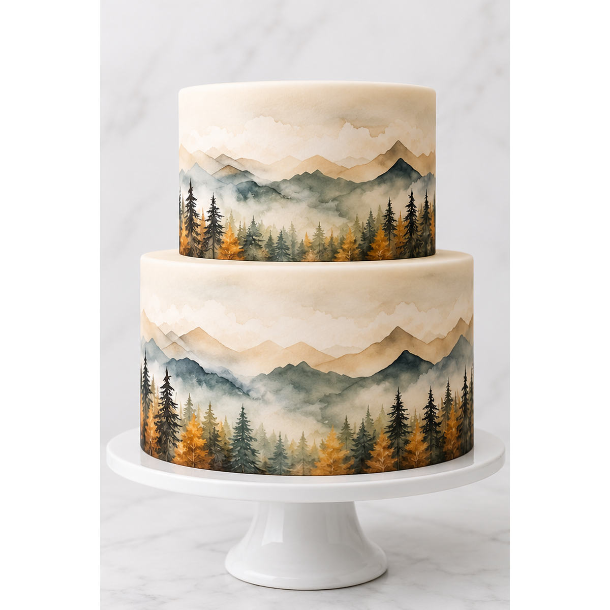 Two-tier cake decorated with misty mountain woodland watercolor edible wraps on a white cake stand