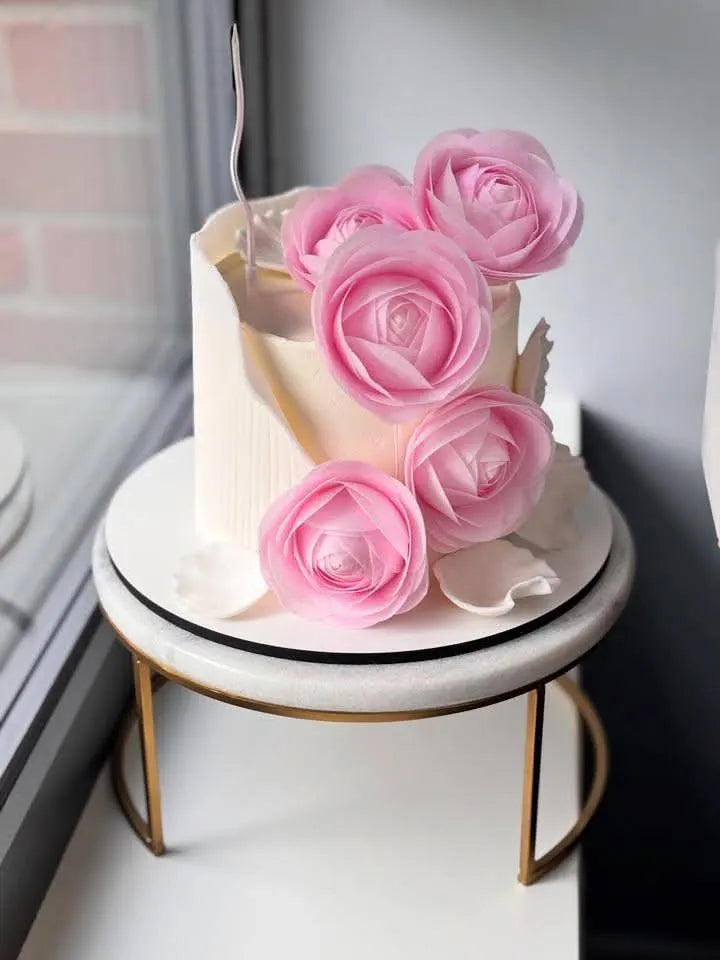 Edible white wafer paper circles for cake toppers and wafer flower designs.