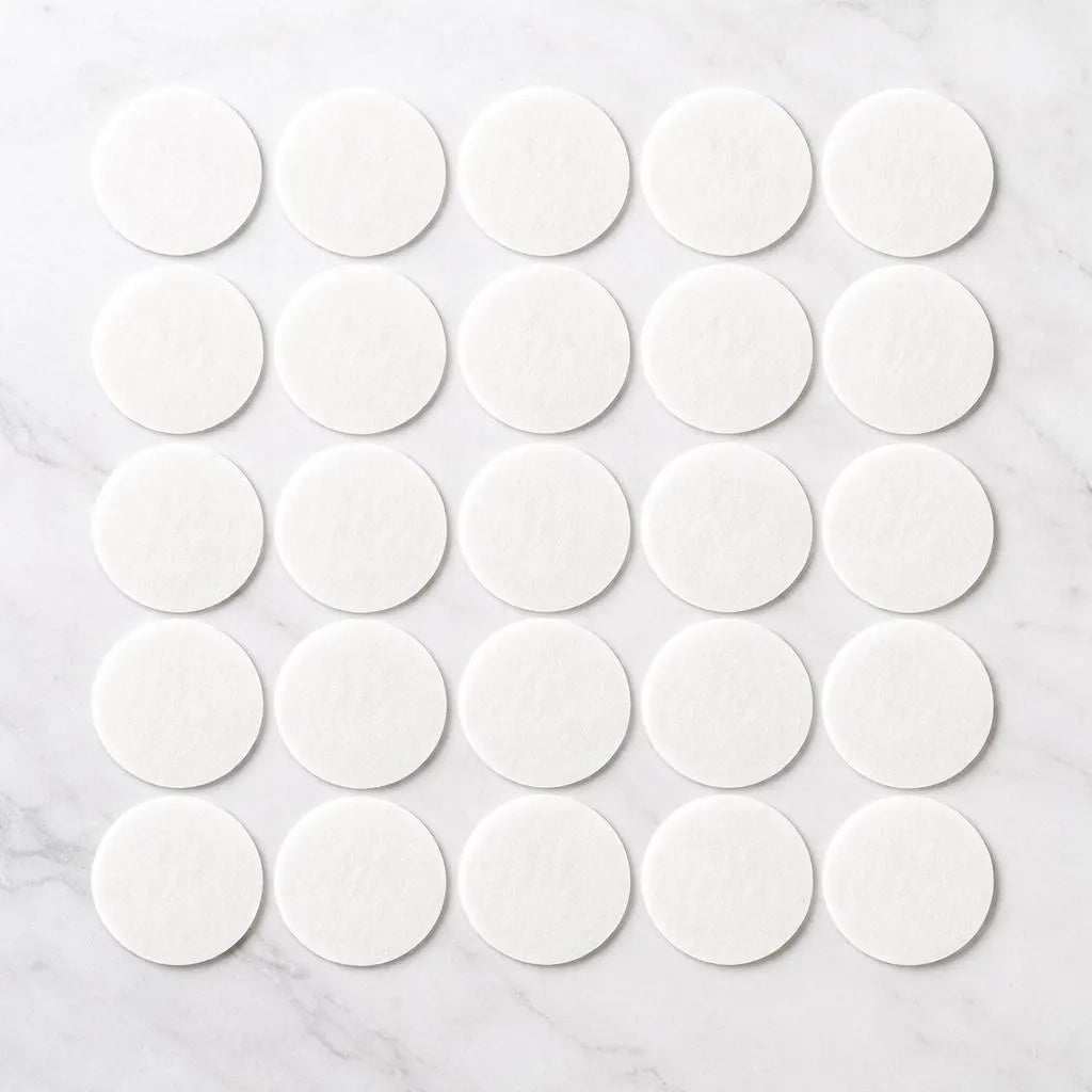 White precut wafer paper circles for decorating cakes, cupcakes and desserts.