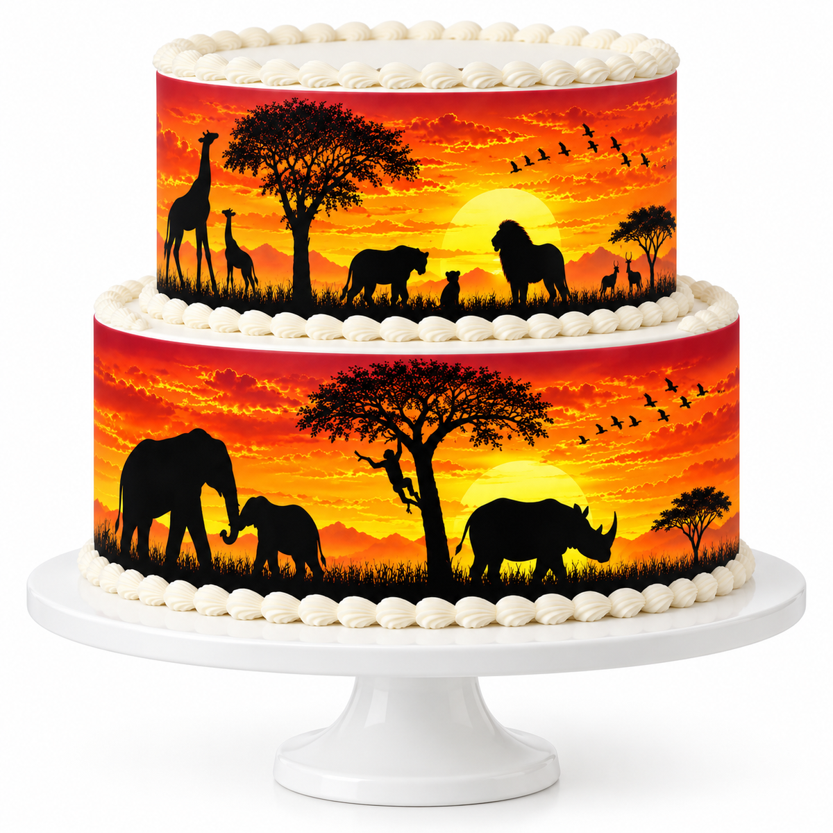 Two-tier safari sunset birthday cake decorated with African wildlife silhouette edible cake wraps on a white pedestal stand