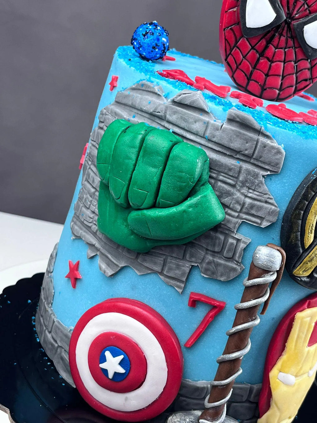 Handmade edible superhero fondant cake decoration, image 6.