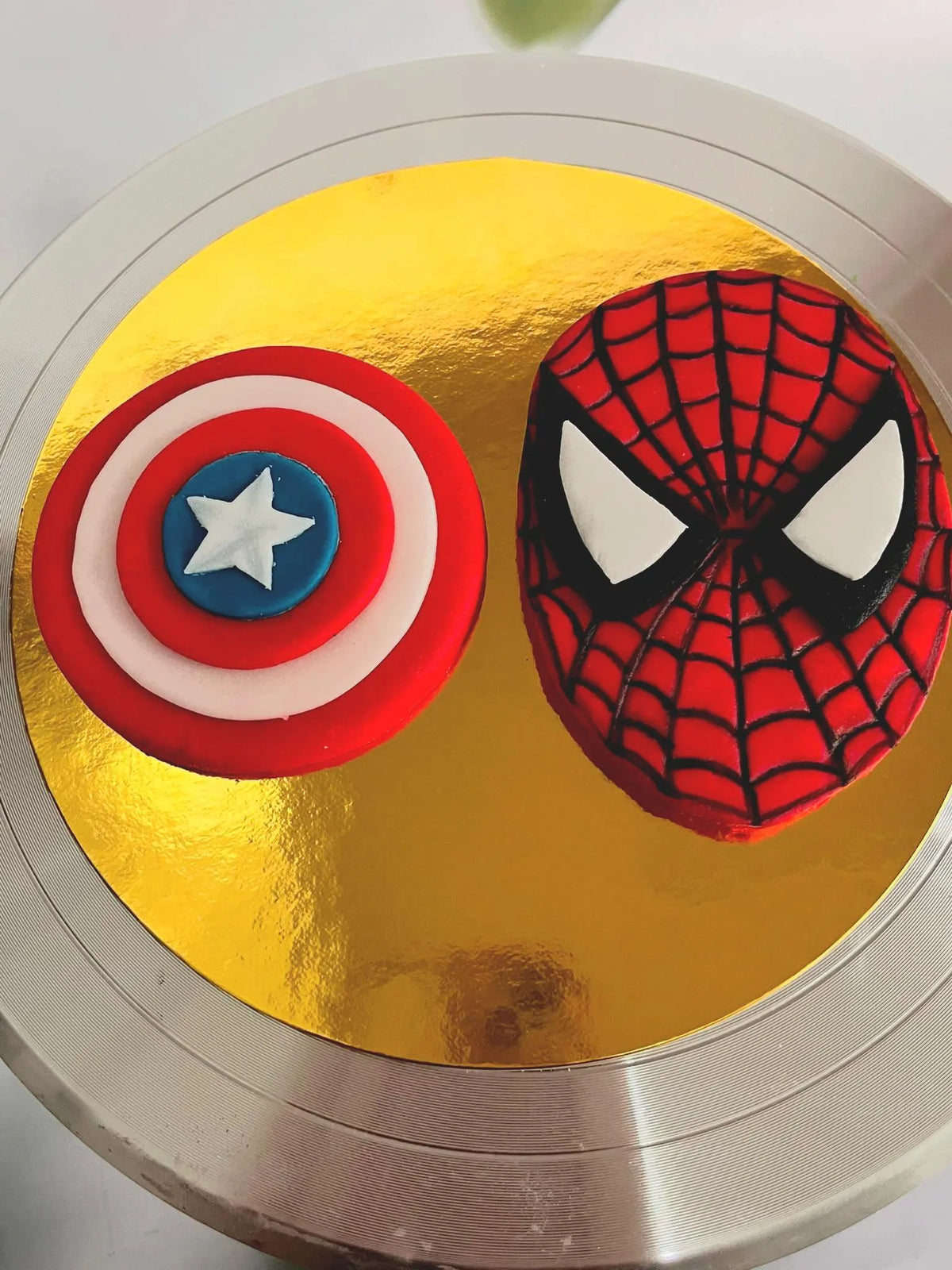 Handmade edible superhero fondant cake decoration, image 7.