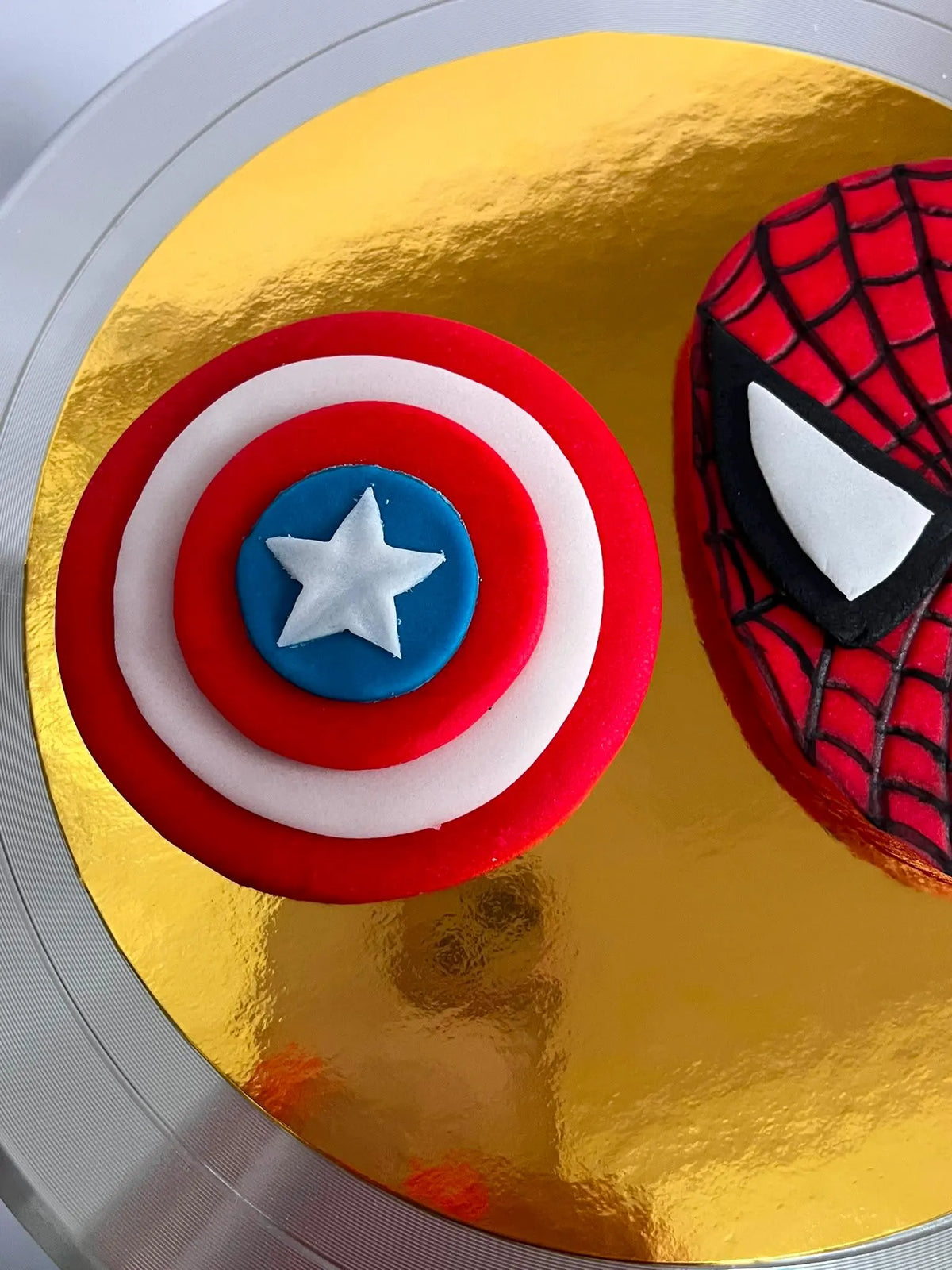 Handmade edible superhero fondant cake decoration, image 8.