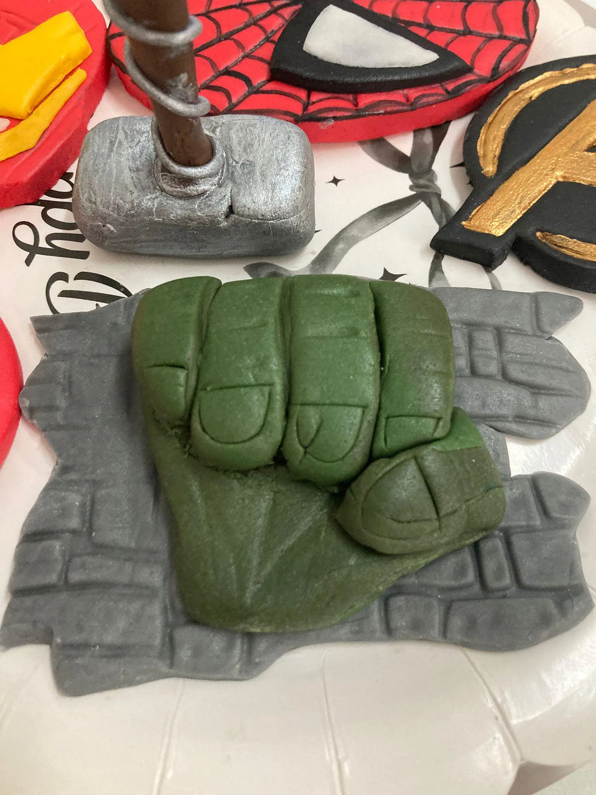 Handmade edible superhero fondant cake decoration, image 11.