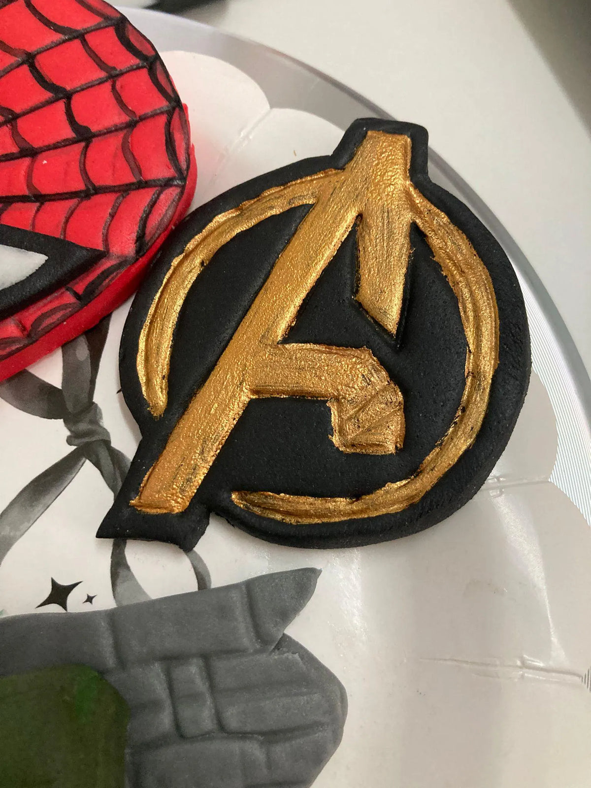 Handmade edible superhero fondant cake decoration, image 12.